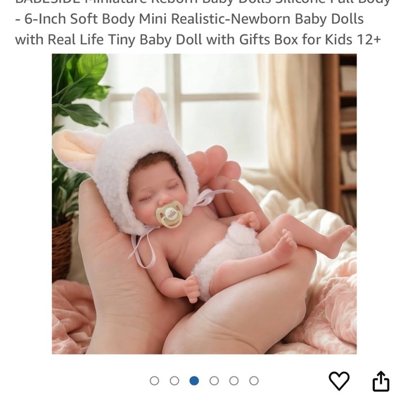 Adorable Reborn Baby Doll with Brown Hair and Cream Outfit - Picture 3 of 10